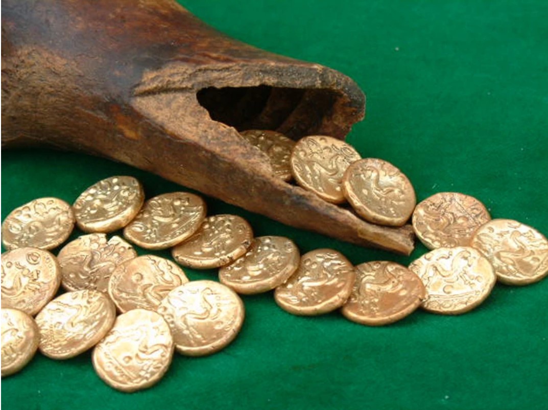 2 100 years old gold coins in beef bone